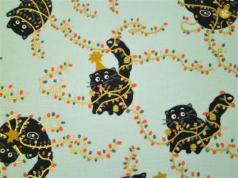 0,1 m Baumwoll-Druckstoff  " Vor Weihnachten: Spielende Katzen"  110 cm br. grün